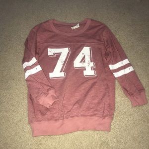 Light pink “74” medium sleeve shirt.